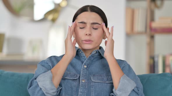 Latin Woman Having Headache