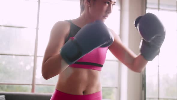 Young Asian woman exercise every morning to stay healthy.