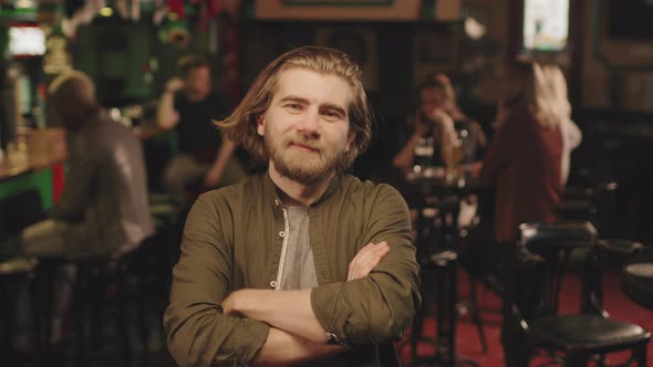 Portrait Of Bearded Man At Bar