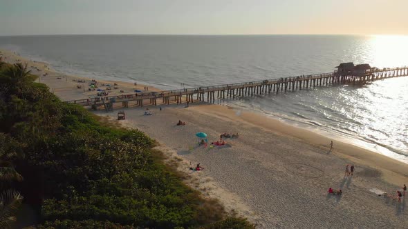 Coast and Beach Near Pier Leaving Into the Ocean