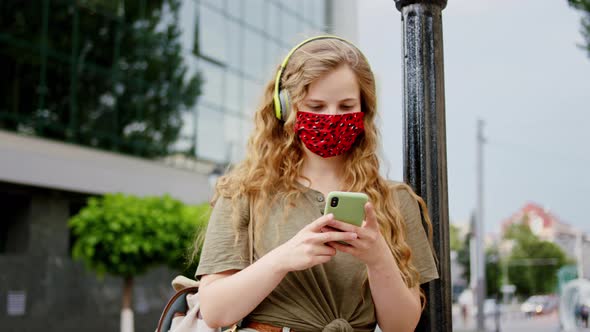 In Front of the Camera Wearing a Protective Mask