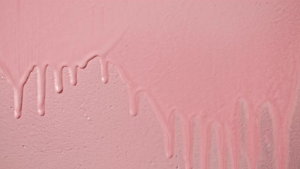 Pink Paint Background Color Tint Drops on Wall Closeup