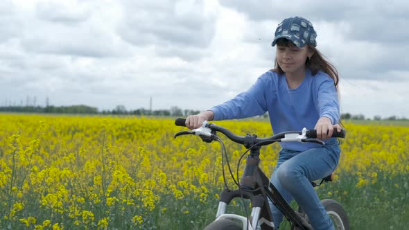 A child on a bicycle.