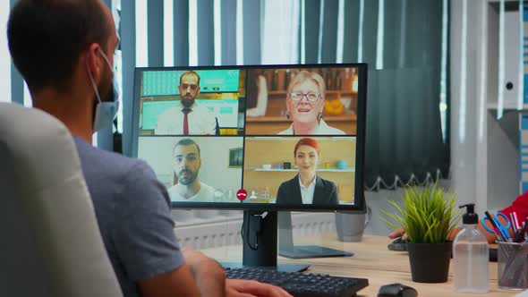 Back View of Man Talking on Video Call