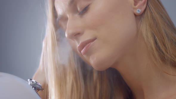 Blonde Model During Facial Treatment Routine