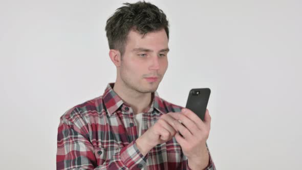 Portrait of Young Man Using Smartphone