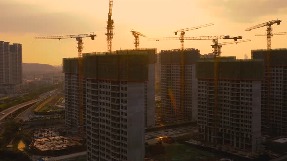 Aerial of construction site at sunset