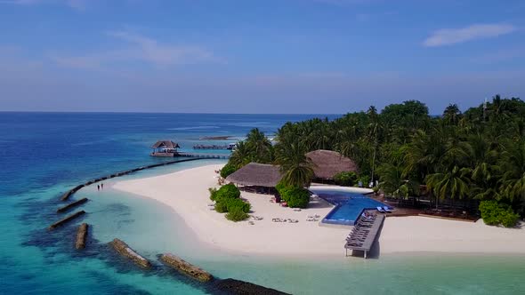 Drone aerial nature of tourist beach wildlife by blue lagoon with sand background