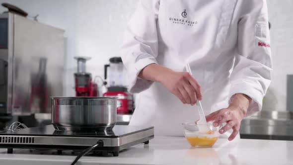 Pastry Chef Whips Mousse for a Signature Cake