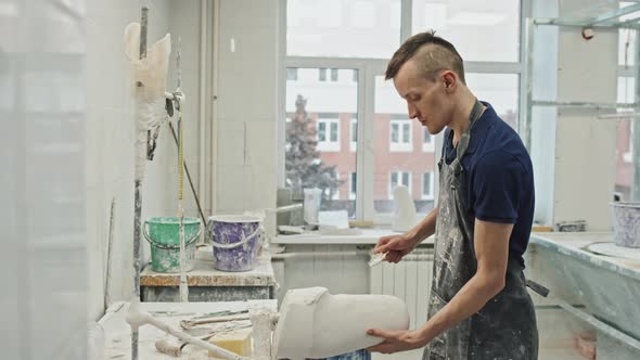 Man Working in Workshop