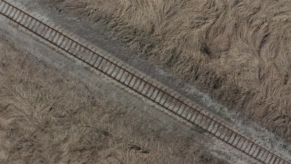 Descending on old railroad track 4K drone video