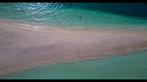 Aerial seascape of beautiful resort beach holiday by aqua blue lagoon and white sandy background of 