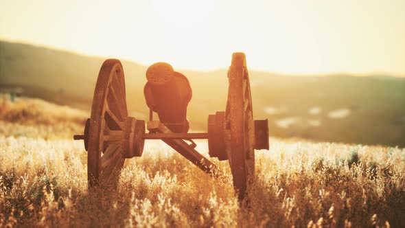 Historic War Gun on the Hill at Sunset