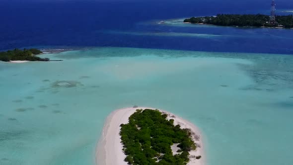 Aerial sky of resort beach by blue ocean with sand background