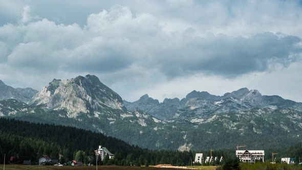 Houses of Zabljak Village and Peaks of Durmitor Mountains with Pine Trees Montenegro