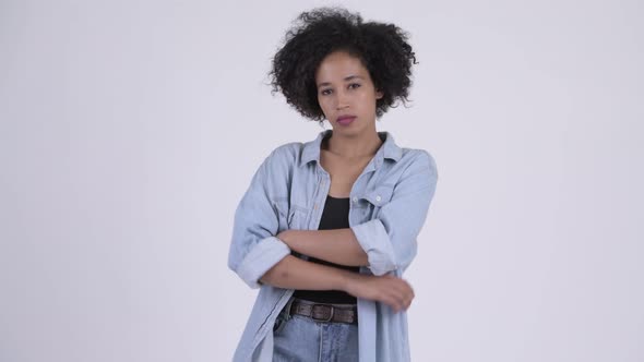 Young Beautiful African Woman with Arms Crossed