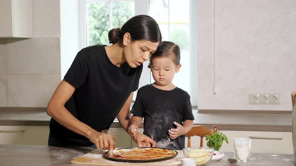 Mother Smudges Delicious Ketchup on Thin Base for Pizza