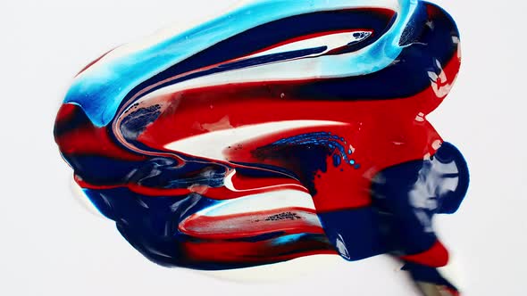 Artist Mixing Ingredients Red and Blue Watercolor Using Palette Knife and Pigments on White