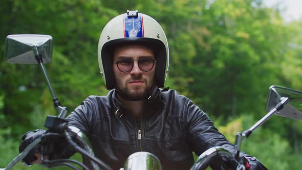 Young man riding a motorcycle