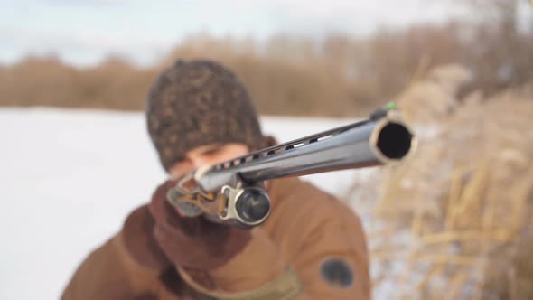 Young Shooter Taking Part in a Contest