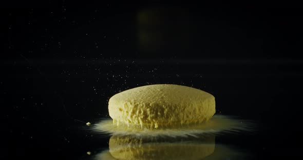 Timelapse of Amber Medicine Pill Capsule Dissolving in Water like a Decomposing Drug Capsule in Stom
