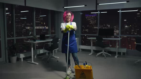 Lgbt Female Maid with Pink Hair Look at Camera and Smile Standing in Modern Corporate Office