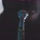Backlit close up view of a men playing the trumpet in his house - VideoHive Item for Sale