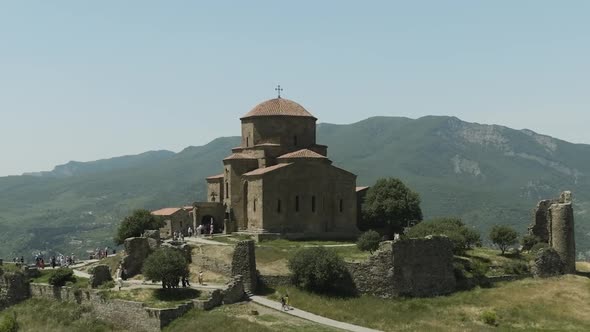 Sixth-Century Georgian Orthodox Monastery Of Jvari Near Mtskheta, Eastern Georgia. Aerial Pullback S