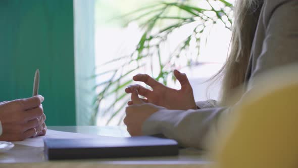 Businesswomen’s Hands Gesticulation