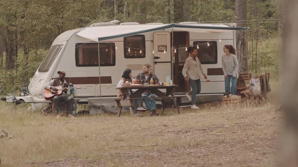 Friends Spending Summertime in Forest