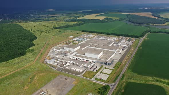 View from above on a huge cargo plant in the midst of nature