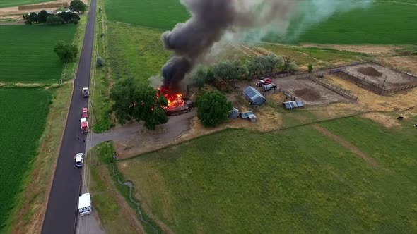 Aerial footage of house burning down