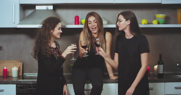 Beautiful Charismatic Ladies Drinking Wine on the