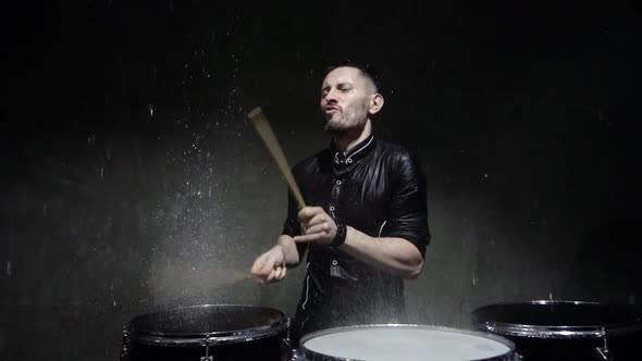 Emotional Drummer Plays in Water Studio.