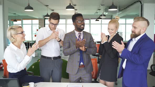 The Business Team Are Applauding Their Joy for Their Success