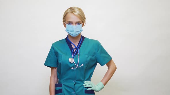 Medical Doctor Nurse Woman with Stethoscope Wearing Protective Mask and Rubber or Latex Gloves