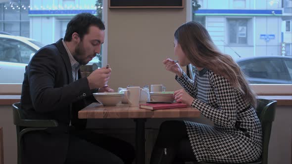 Business People Enjoy Lunch Meal at Restaurant