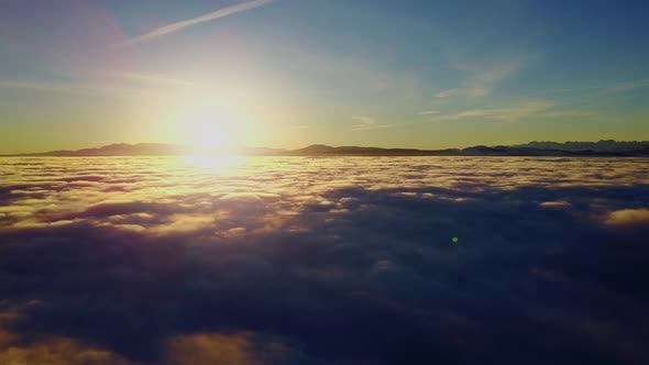 Above the Clouds At Sunrise