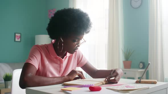 Young Woman Is Reading Book