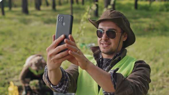 Gardener Filming Himself