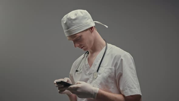 Young Doctor In White Hat