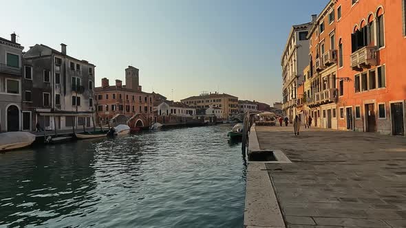 Fpv of Fondamenta Cannaregio and  Venetian canal, Venice in Italy. Slow motion