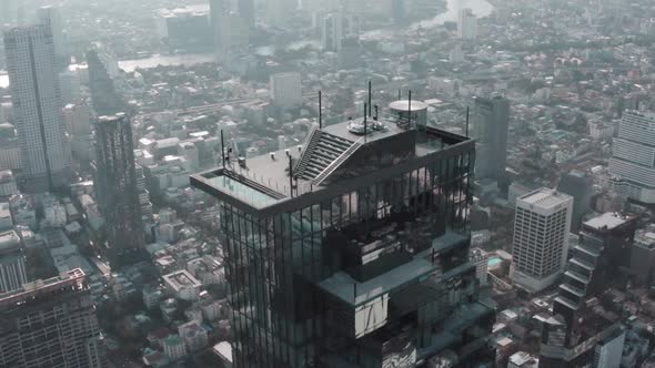 Aerial View of Sathorn District, Chong Nonsi, King Power Mahanakhon Tower and Skywalk in Bangkok