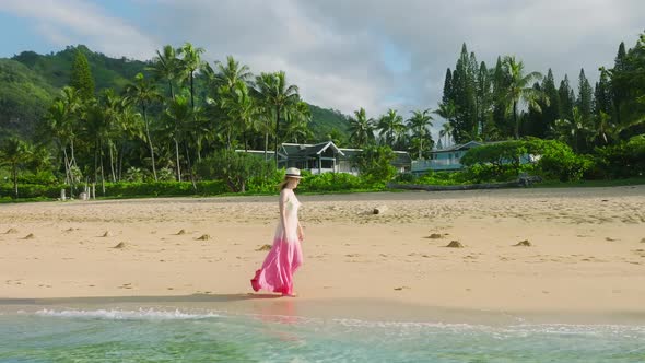 Aerial Slow Motion Romantic Confident Young Woman in Beach Dress Waving on Wind