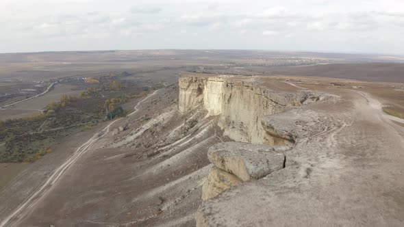 Amazing Aerial View High Cliff on Empty Steppe and Skyline Landscape