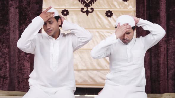Muslim men getting ready for ramadan prayer