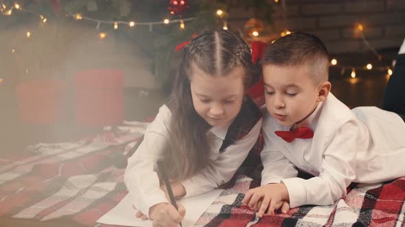 Kids Writing Letter To Santa on Christmas