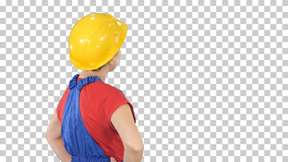 Engineer construction worker woman turning to camera and smiling