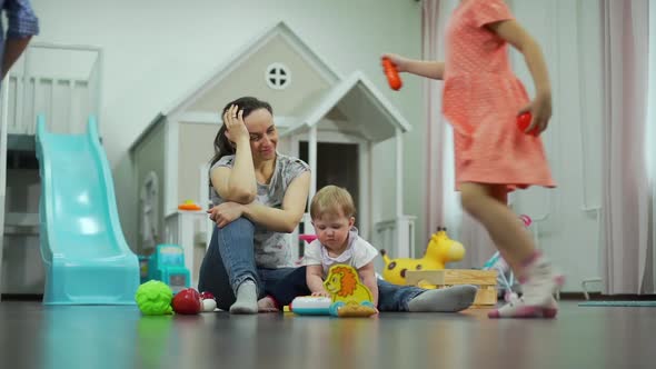 Babysitter Feels Exhausted By Naughty Kids