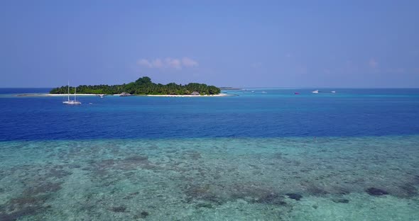 Beautiful aerial abstract view of a sunshine white sandy paradise beach and blue water background in